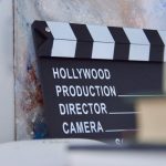 black and white wooden wall mounted signage